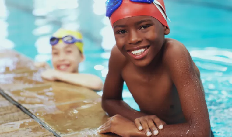 Boy and girl in pool