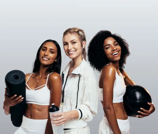 3 ladies with fitness equipment