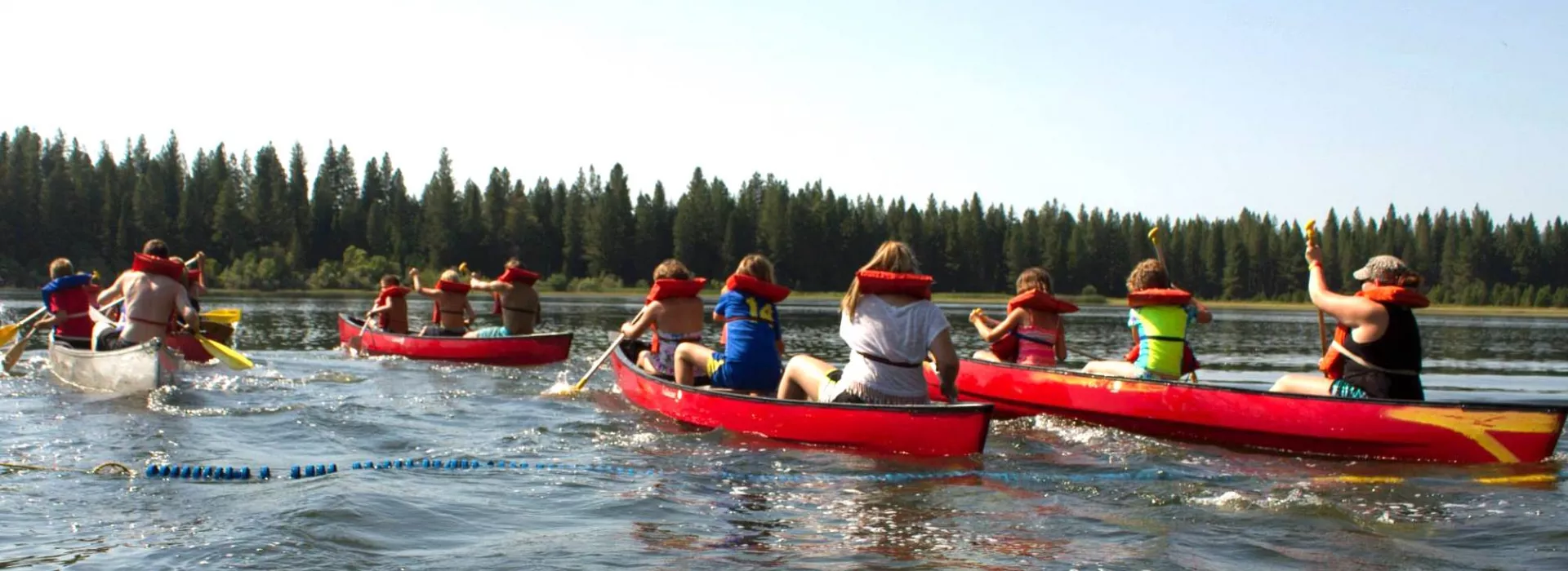 Kids in Canoes on Lake
