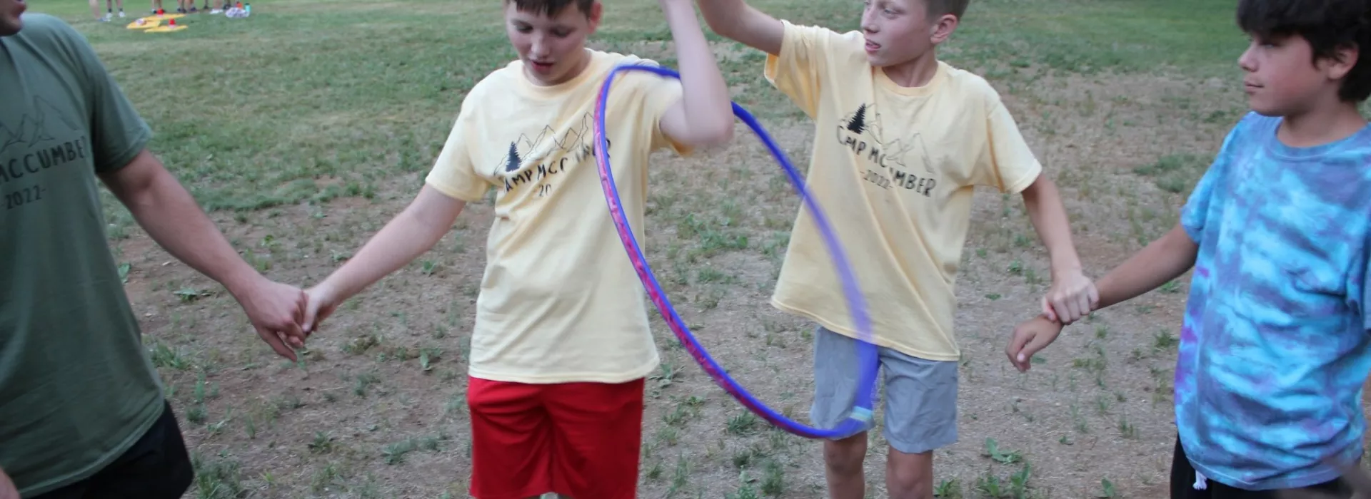 Camp McCumber hula hoop game