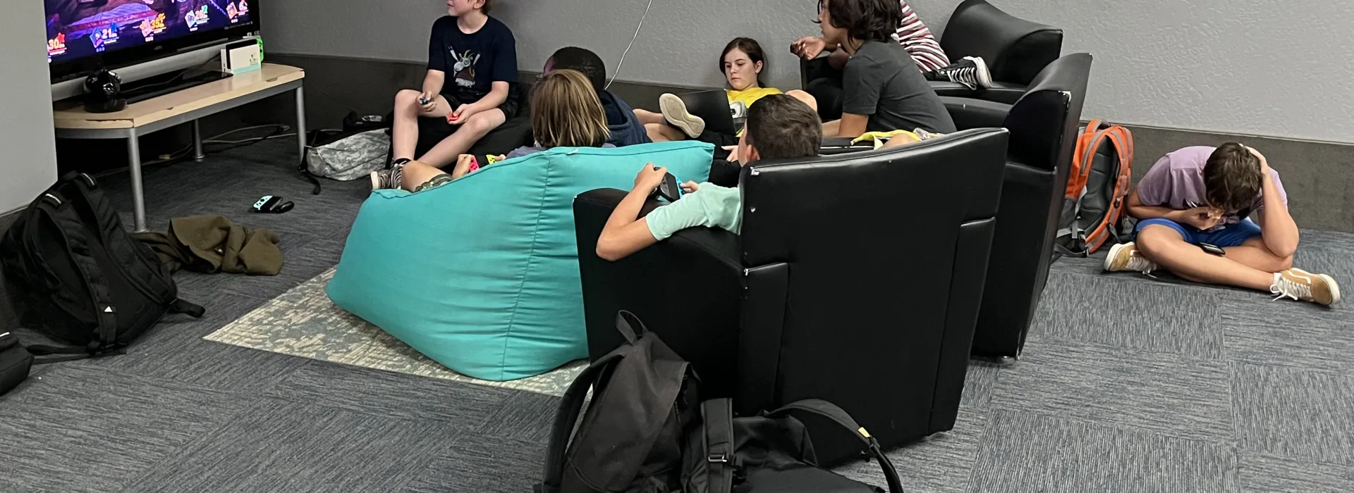 group hanging out watching TV